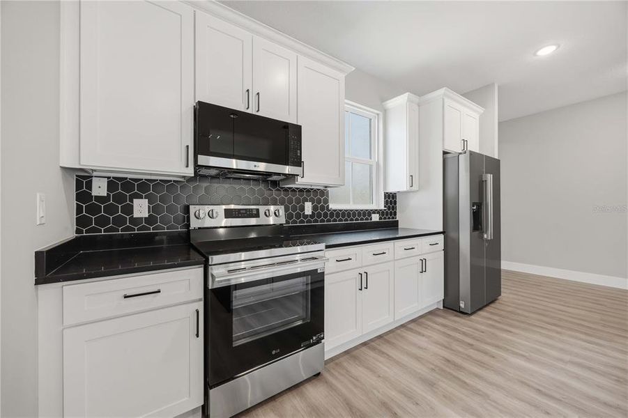 Furnished interior view inside a new home in , Winter Haven (Image 14).