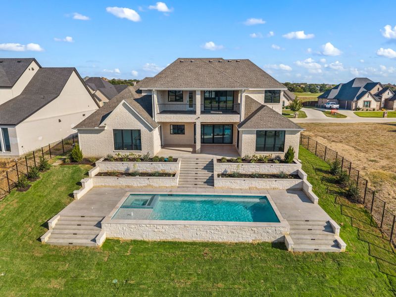 Exterior details and patio area of a home in The Resort on Eagle Mt. Lake, Fort Worth (Image 34).