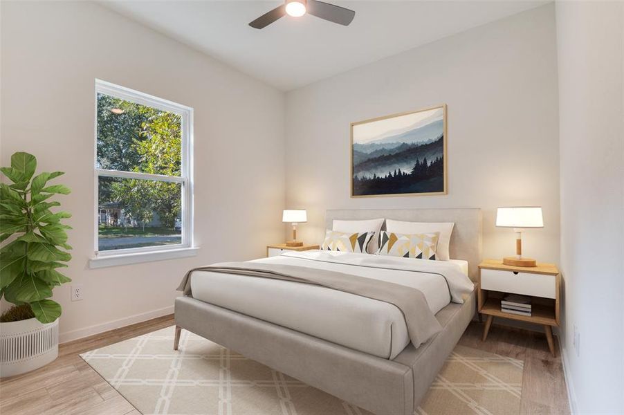 Bedroom featuring light wood-style floors and ceiling fan