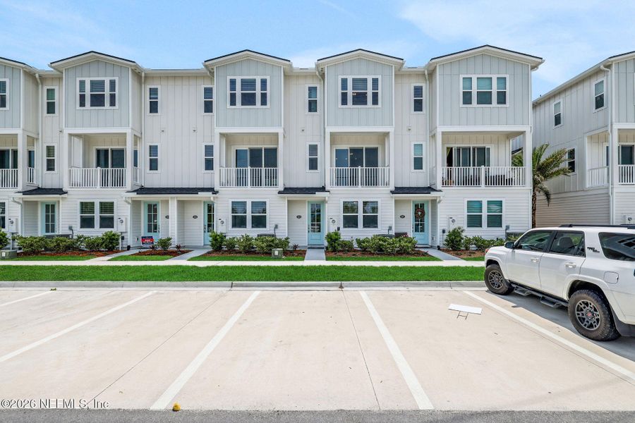 Front exterior of a new home in , Jacksonville Beach, FL, highlighting curb appeal (Image 23).