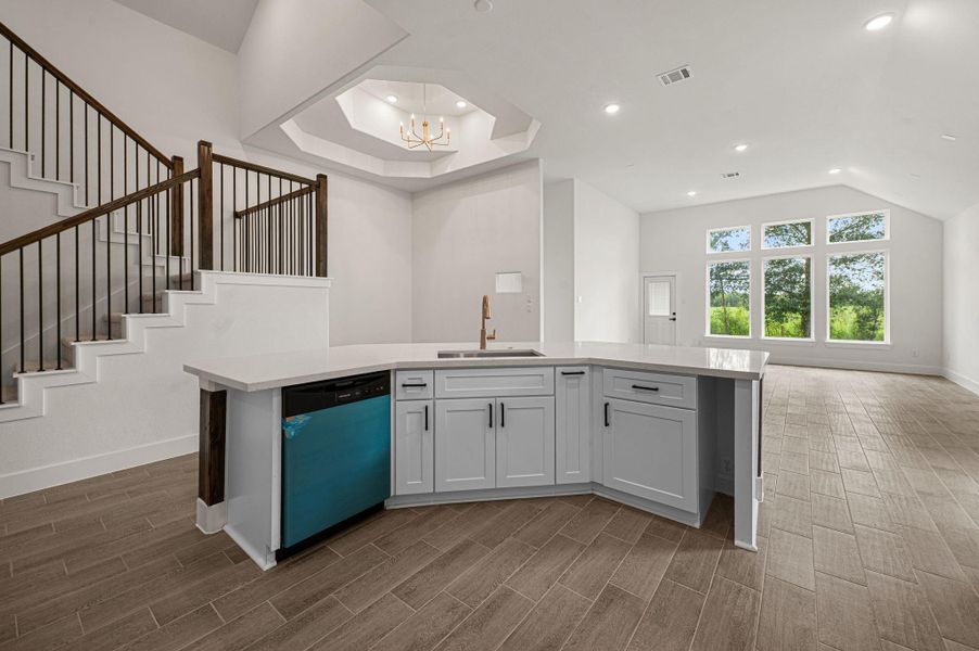 Seven bottle wine fridge to be installed in right corner of island.