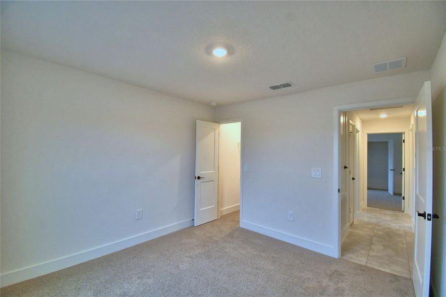 Spacious, unfurnished interior of a new home in Cadence Crossing, Auburndale (Image 44).