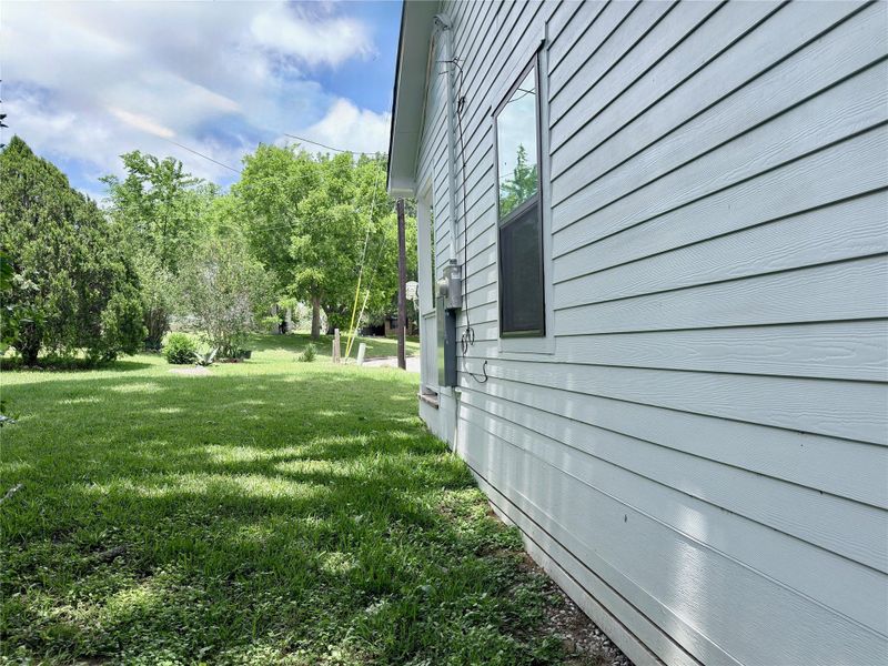 Exterior details and patio area of a home in , Brenham (Image 13).