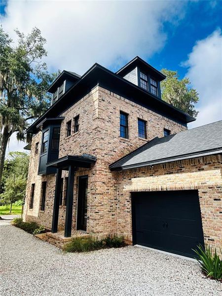 Front exterior of a new home in , Gainesville, FL, highlighting curb appeal (Image 22).