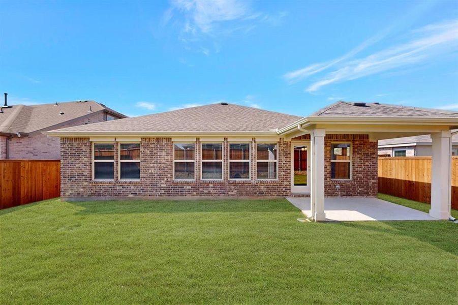 Front exterior of a new home in Mobberly Farms, Pilot Point, TX, highlighting curb appeal (Image 14).