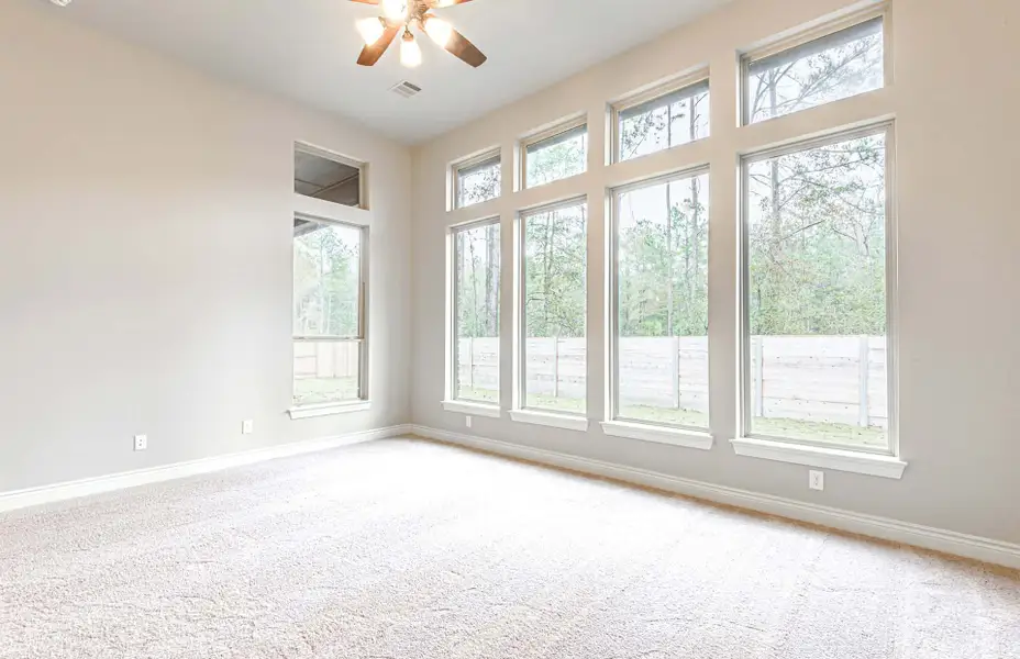 Representative unfurnished interior of a home built from the 3616 by Ravenna Homes in Artavia 70′, Conroe (Image 42).