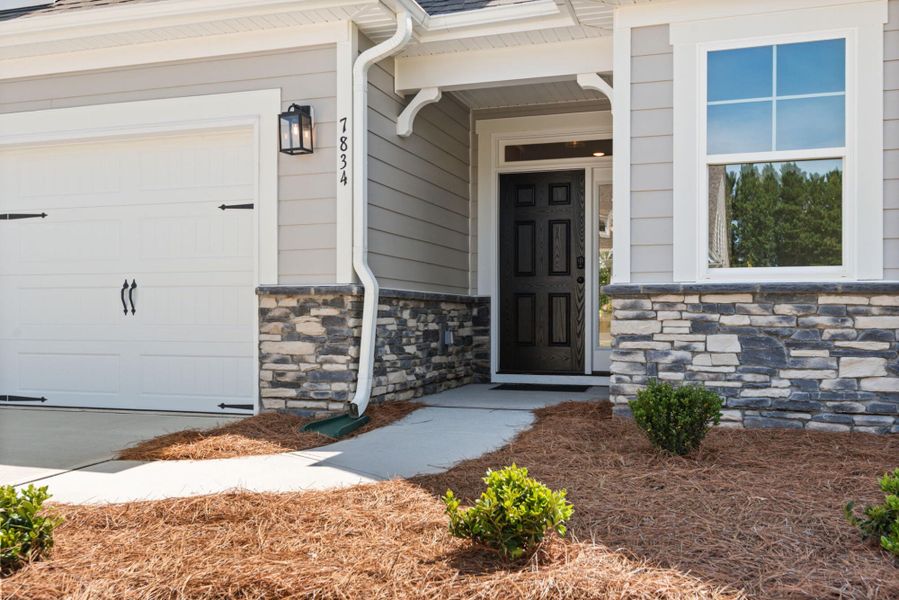 Exterior details and patio area of a home in Grove Park, Clemmons (Image 2).