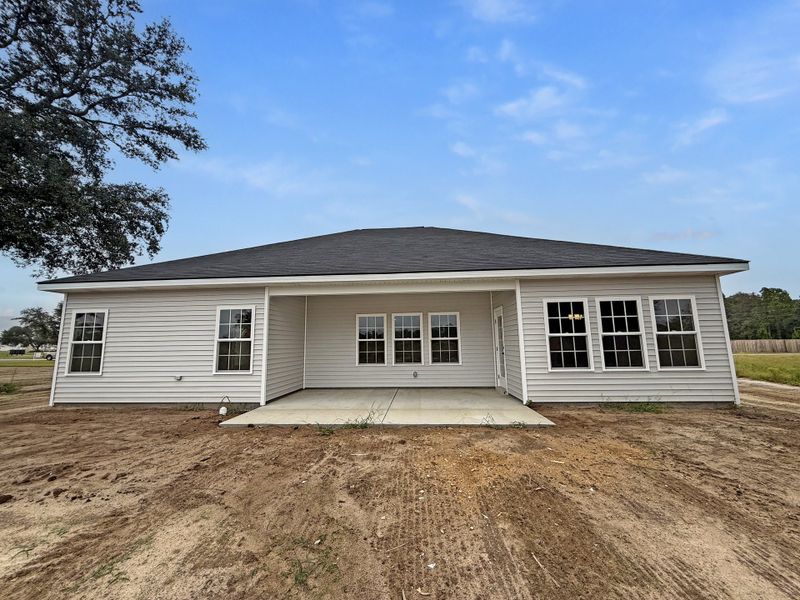 Front exterior of a new home in Tibet Road at Sassafras, Allenhurst, GA, highlighting curb appeal (Image 2).