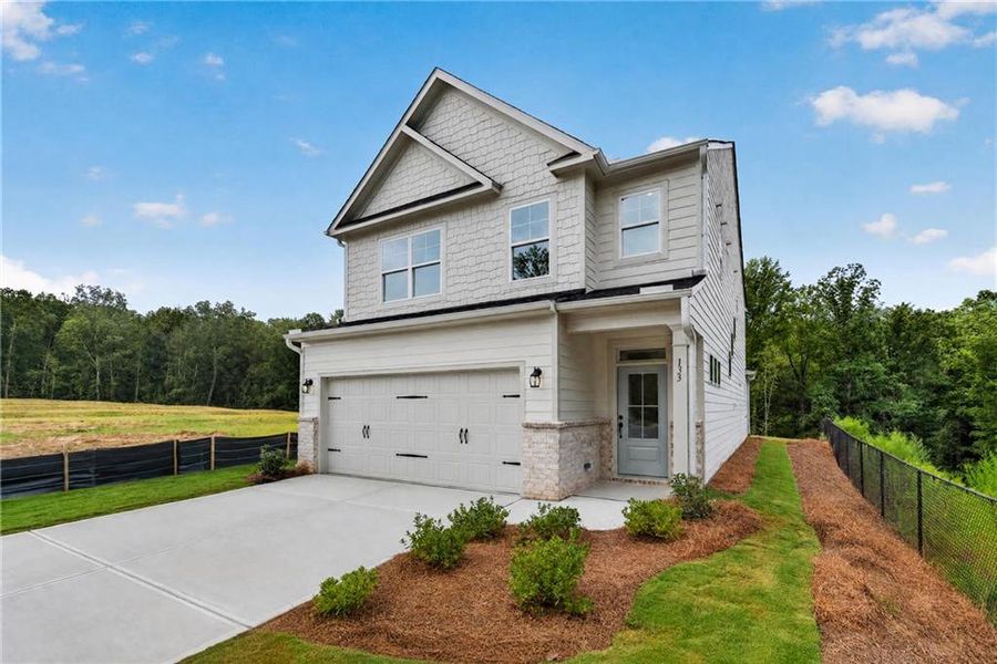 Front exterior of a new home in Villas at Dawsonville, Dawsonville, GA, highlighting curb appeal (Image 2).