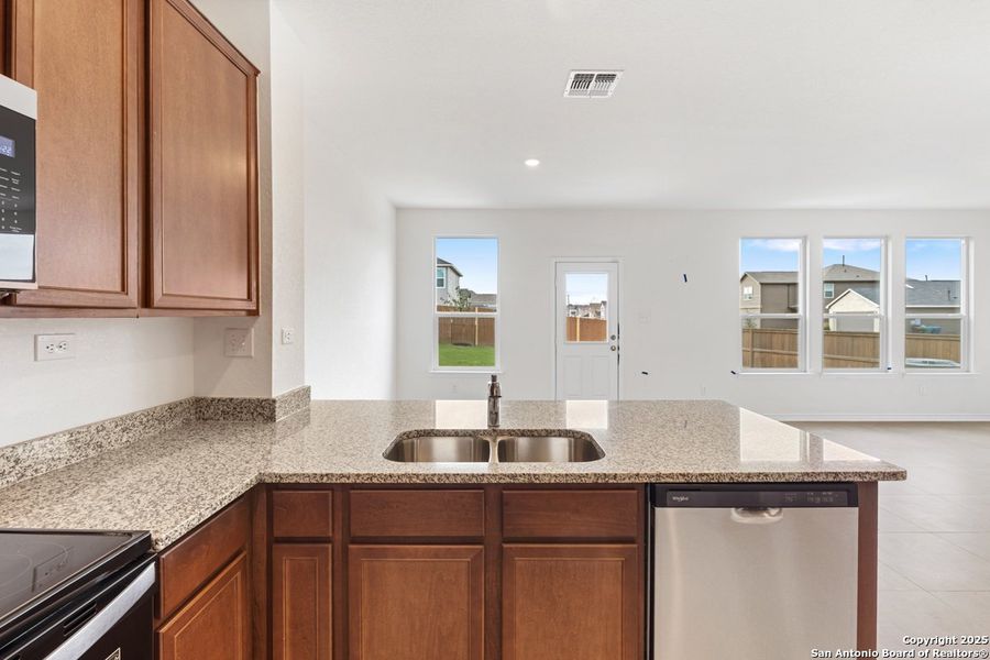 Furnished interior view inside a new home in Southton Cove, Elmendorf (Image 6).