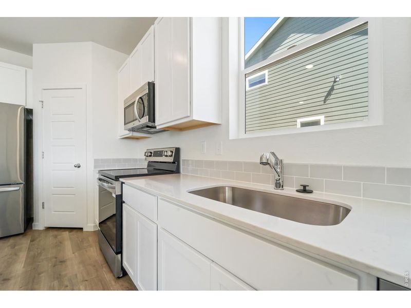 Furnished interior view inside a new home in Liberty Draw, Evans (Image 5).