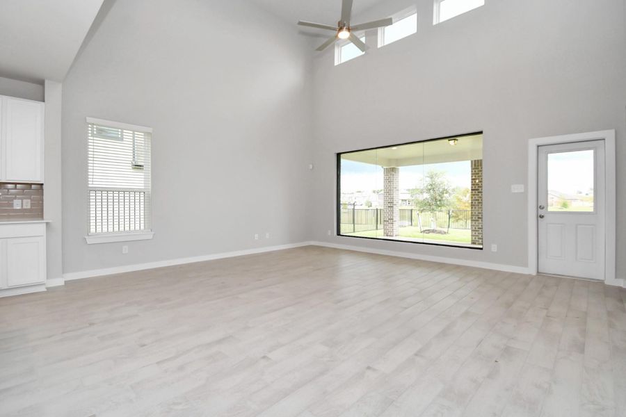 Take another glimpse into the heart of the home with this additional view of the family room—a sprawling space ready to accommodate all your gatherings. Sample photo of completed home with similar floor plan. Actual colors and selections may vary. Take another glimpse into the heart of the home with this additional view of the family room—a sprawling space ready to accommodate all your gatherings. Sample photo of completed home with similar floor plan. Actual colors and selections may vary.