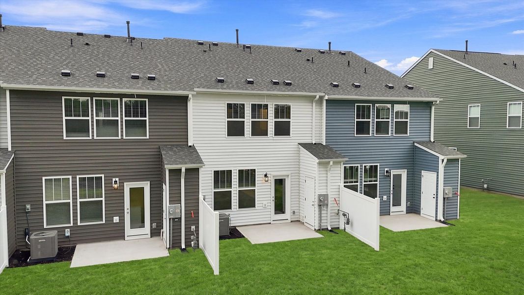 Warm and inviting backyard space with a spacious backyard and tasteful finishes in Spartanburg, SC Warm and inviting backyard space with a spacious backyard and tasteful finishes in Spartanburg, SC