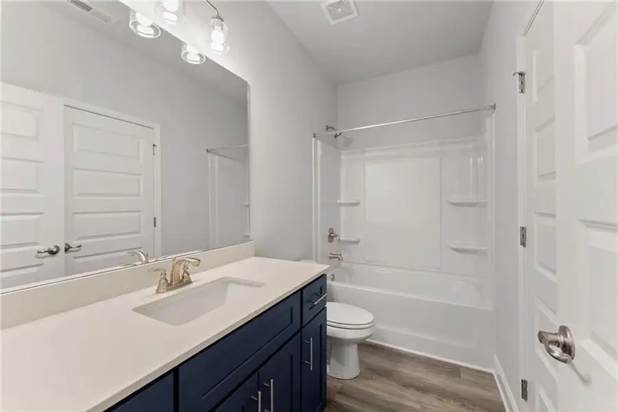Representative furnished interior of a home built from the 2620 by Adams Homes in Williams Ridge, Bailey (Image 14). Representative furnished interior of a home built from the 2620 by Adams Homes in Williams Ridge, Bailey (Image 14).