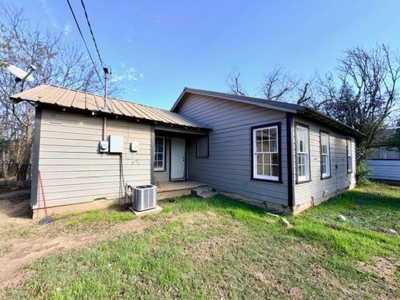 Exterior details and patio area of a home in , Brownwood (Image 10). Exterior details and patio area of a home in , Brownwood (Image 10).