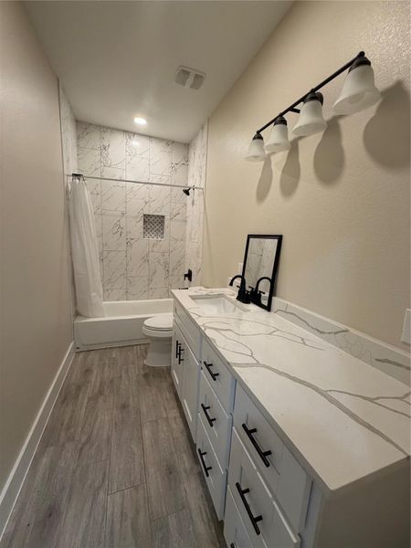 Furnished interior view inside a new home in , Conroe (Image 6).