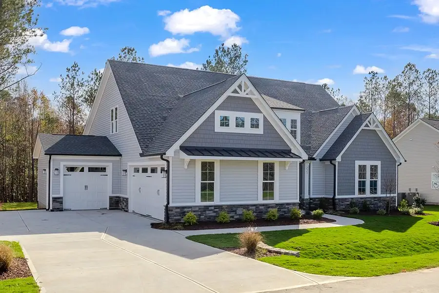 Representative exterior photo of a completed home built from the The Bradley by RobuckHomes in Baylee Ridge, Selma, NC (Image 38). Representative exterior photo of a completed home built from the The Bradley by RobuckHomes in Baylee Ridge, Selma, NC (Image 38).