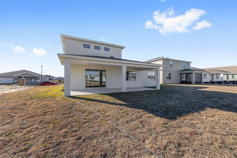 Exterior details and patio area of a home in Calesa Township, Ocala (Image 27).