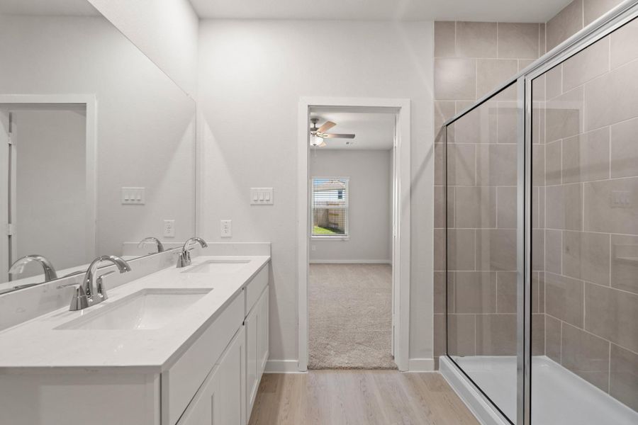 Furnished interior view inside a new home in Sunterra, Katy (Image 6).