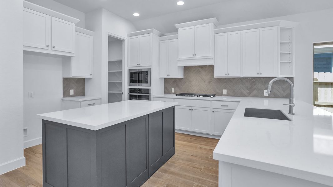 Furnished interior view inside a new home in Grand Central Park, Conroe (Image 7).