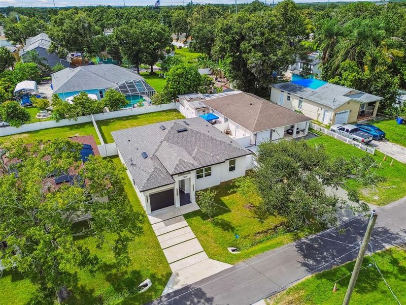 Front exterior of a new home in , Tampa, FL, highlighting curb appeal (Image 22).