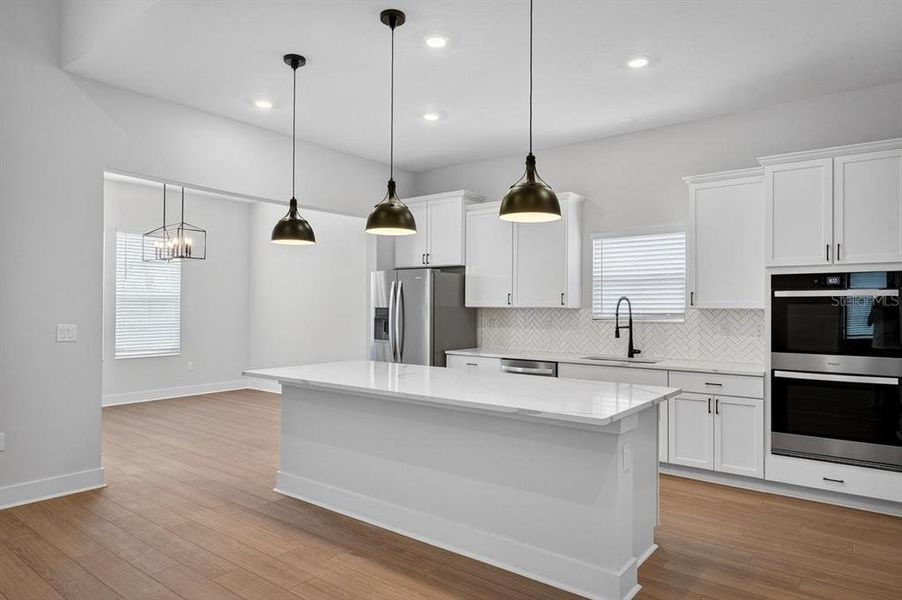Furnished interior view inside a new home in Stables at Cary Forest, Bryceville (Image 7).