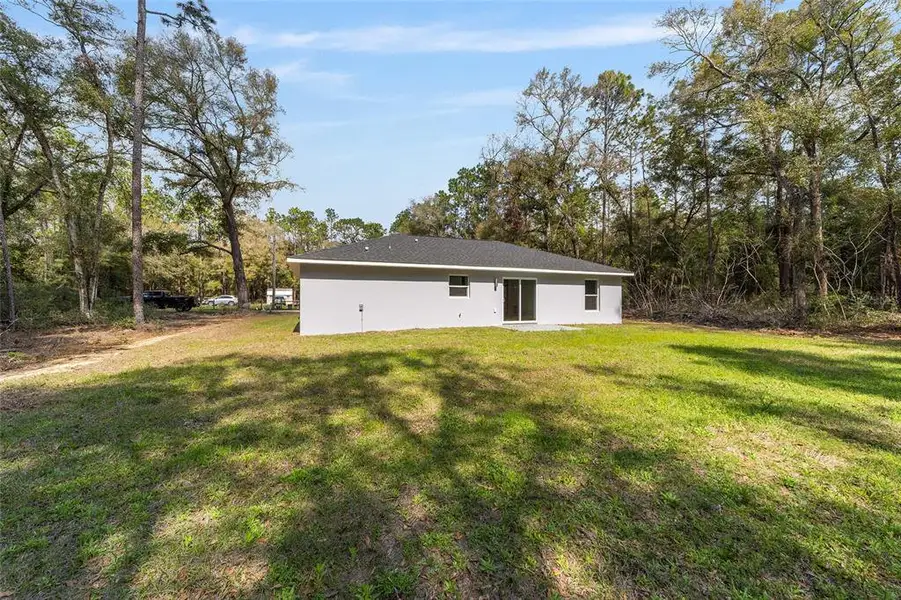 Exterior details and patio area of a home in , Ocala (Image 4).