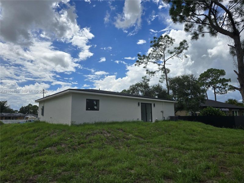Exterior details and patio area of a home in , Lehigh Acres (Image 3).