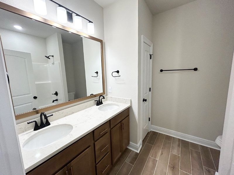 Furnished interior view inside a new home in Natureview, Freeport (Image 10).