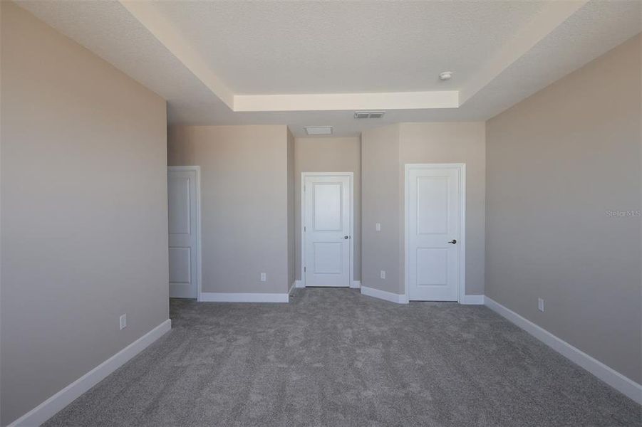 Spacious, unfurnished interior of a new home in Lake Star at Ovation, Winter Garden (Image 18).