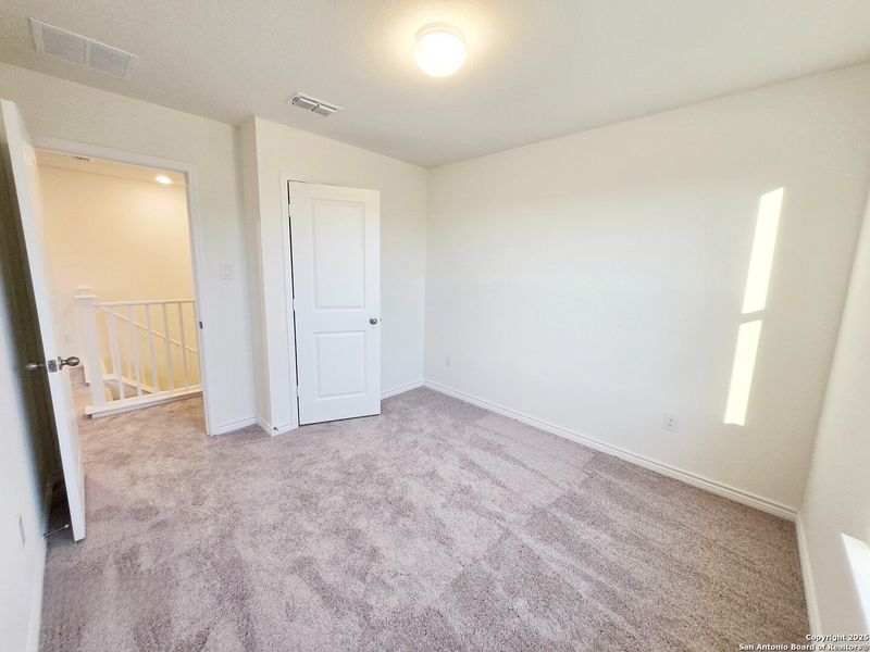Spacious, unfurnished interior of a new home in Cove at Westover Hills, San Antonio (Image 18).