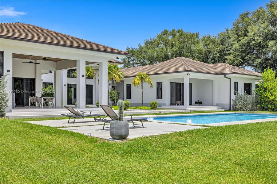 Front exterior of a new home in , Pinecrest, FL, highlighting curb appeal (Image 21).