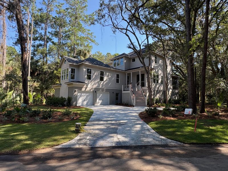 Front exterior of a new home in , Seabrook Island, SC, highlighting curb appeal (Image 26).