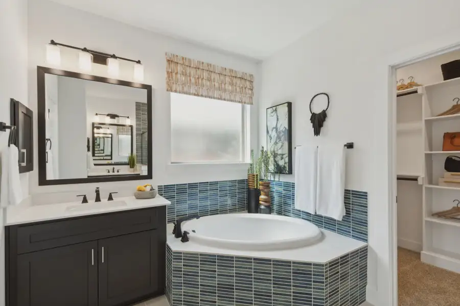 Representative furnished interior of a home built from the Wimberly by Chesmar Homes in Summer Crest, Crowley (Image 9).