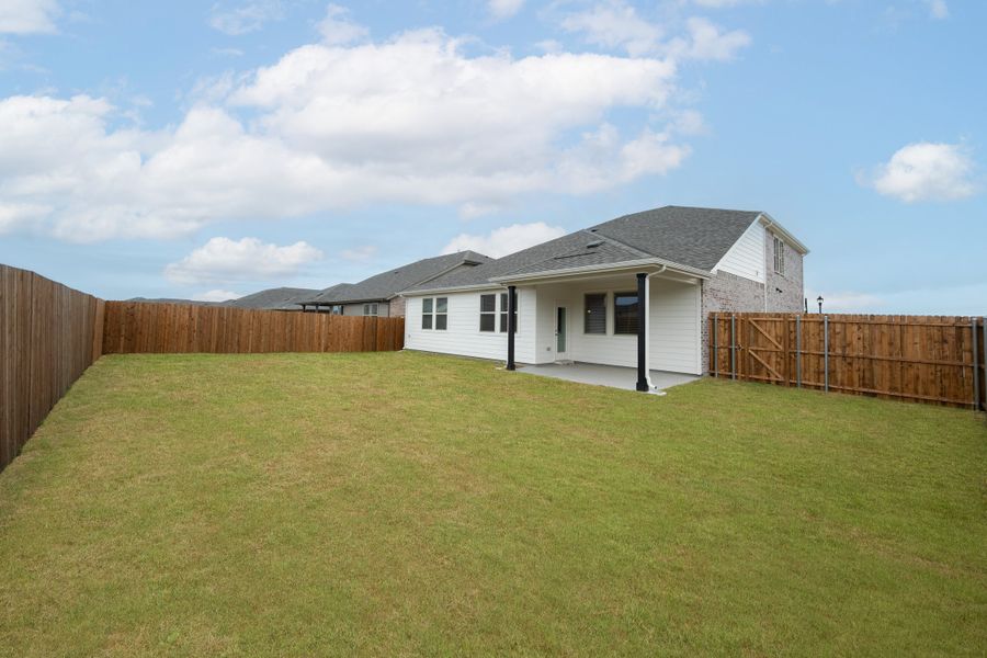 Exterior details and patio area of a home in Churchill, Anna (Image 2).