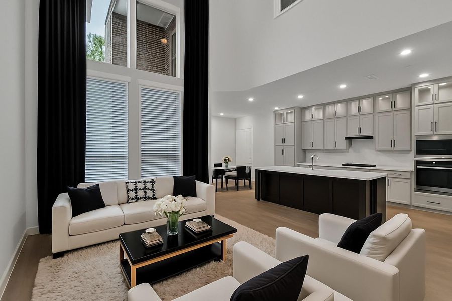 Open and spacious floor plan in the family room, kitchen, and dining room.