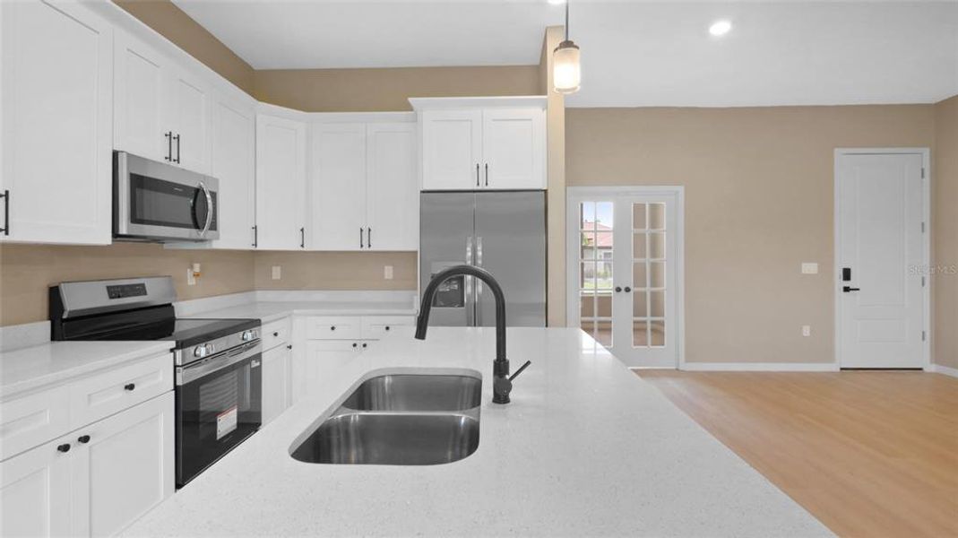 Furnished interior view inside a new home in , Port Charlotte (Image 10).