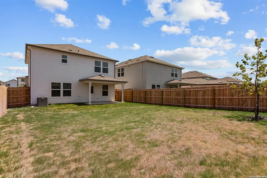Exterior details and patio area of a home in , New Braunfels (Image 4).