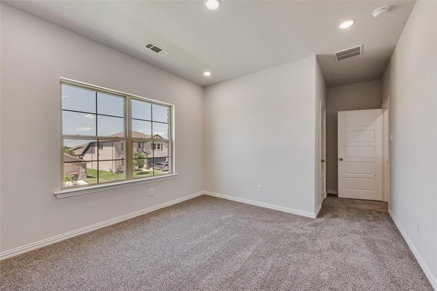 Spacious, unfurnished interior of a new home in Villages of Hurricane Creek, Anna (Image 26). Spacious, unfurnished interior of a new home in Villages of Hurricane Creek, Anna (Image 26).