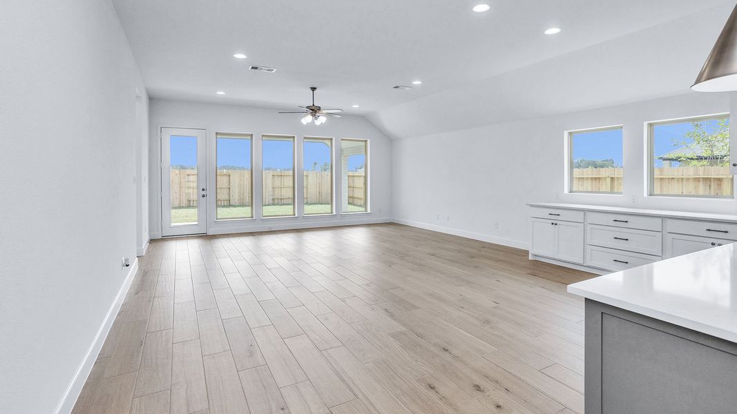 Representative unfurnished interior of a home built from the 2504W by Perry Homes in La Cima, San Marcos (Image 47).