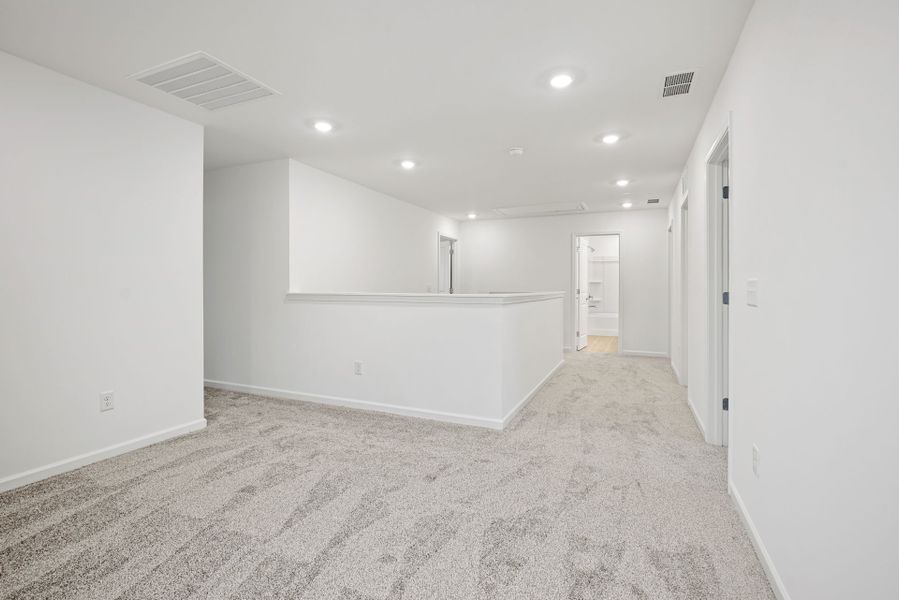 Spacious, unfurnished interior of a new home in Bryton, Huntersville (Image 39).