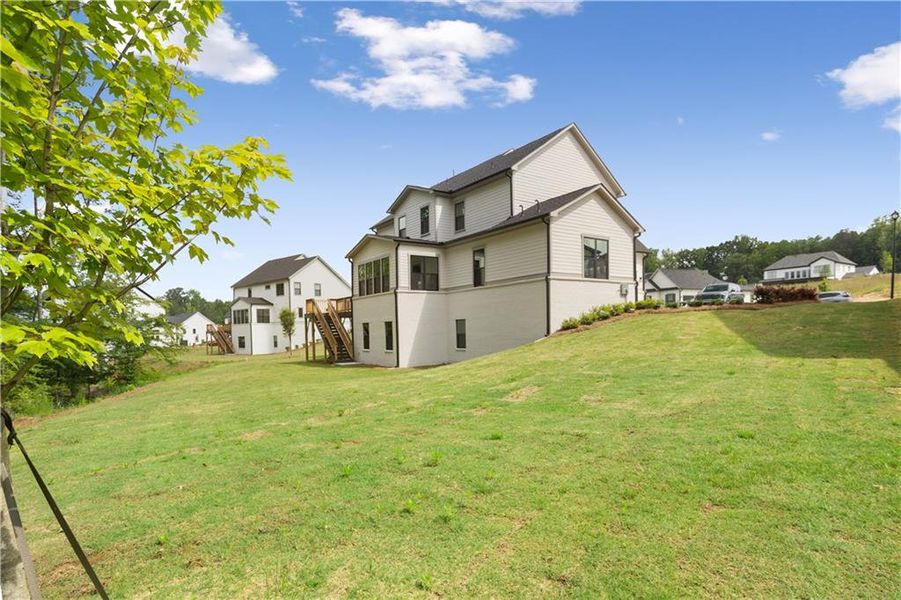 Front exterior of a new home in , Cumming, GA, highlighting curb appeal (Image 28).