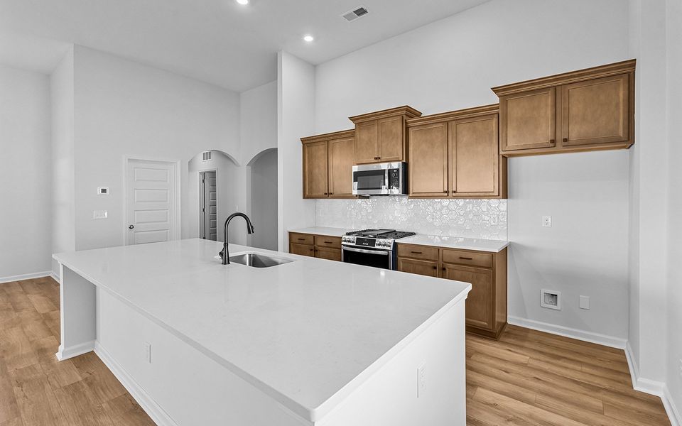 Furnished interior view inside a new home in Brayden, Advance (Image 8).