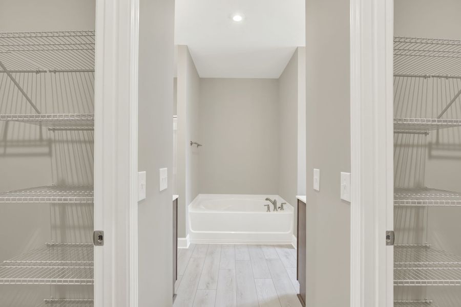 Aspen Plan Owner's Bath Entrance with Dual Walk-in Closets