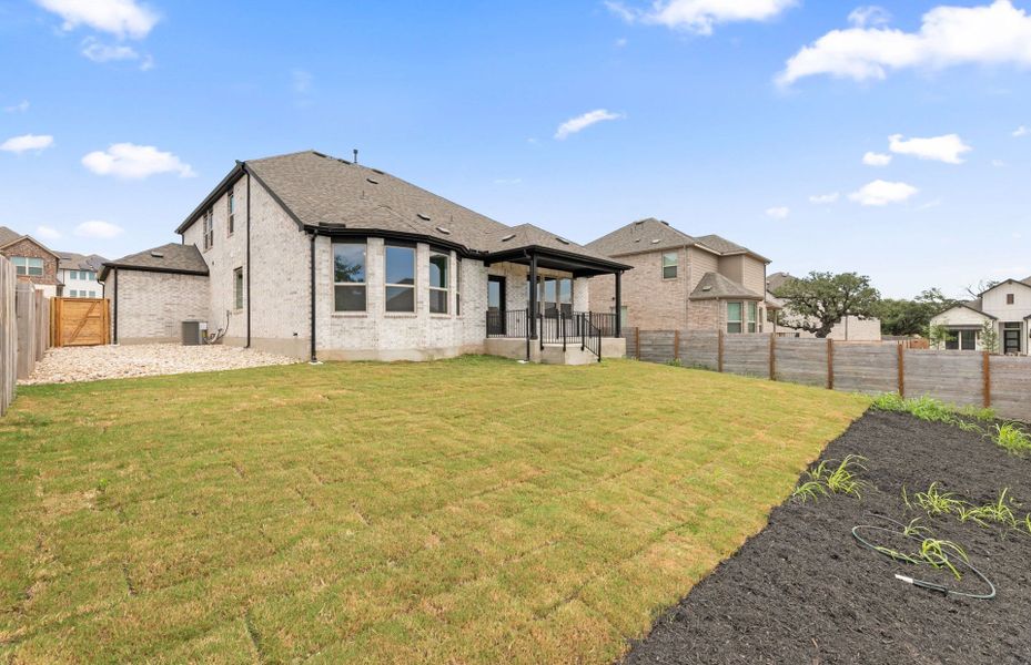 Exterior details and patio area of a home in Bluffview Reserve, Leander (Image 26).