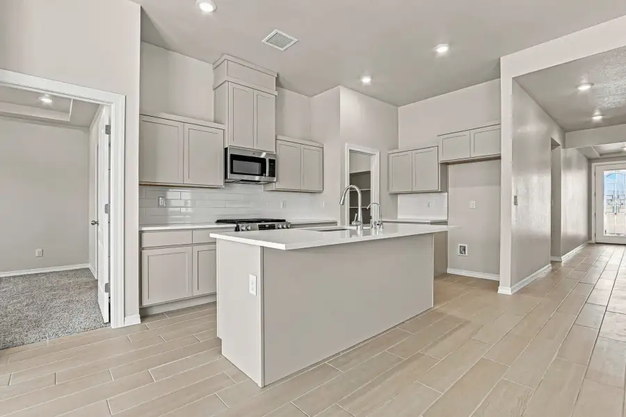 Furnished interior view inside a new home in Desert Breeze, Horizon City (Image 13).