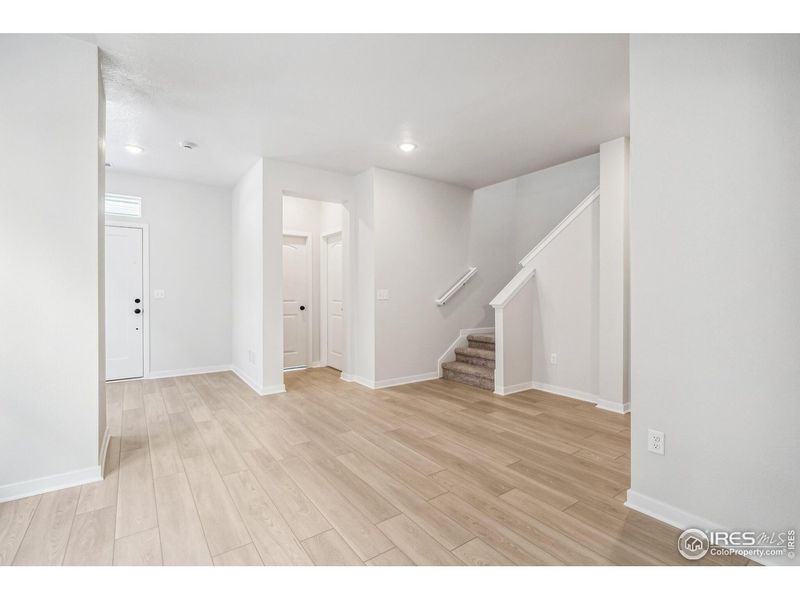 Spacious, unfurnished interior of a new home in Kinston Mainstreet Townhomes, Loveland (Image 26).