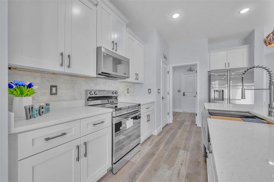 Furnished interior view inside a new home in , Poinciana (Image 18).