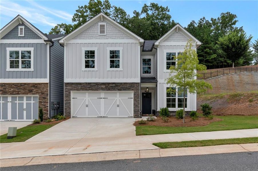 Front exterior of a new home in , Canton, GA, highlighting curb appeal (Image 17). Front exterior of a new home in , Canton, GA, highlighting curb appeal (Image 17).
