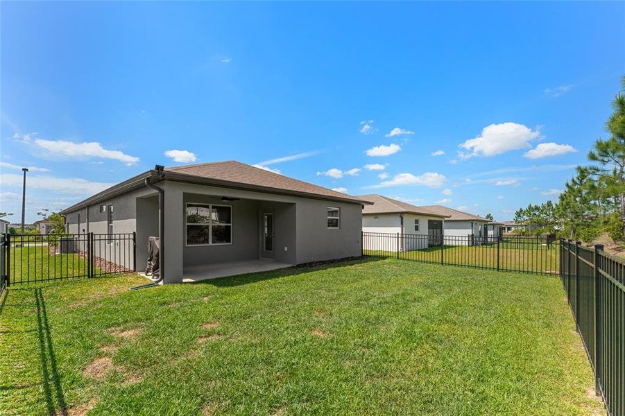Exterior details and patio area of a home in Del Webb Stone Creek, Ocala (Image 22).
